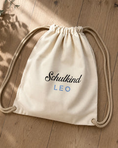 Schulkind Signature Turnbeutel | personalisiert mit Namen | Schriftzug in pearl-blue